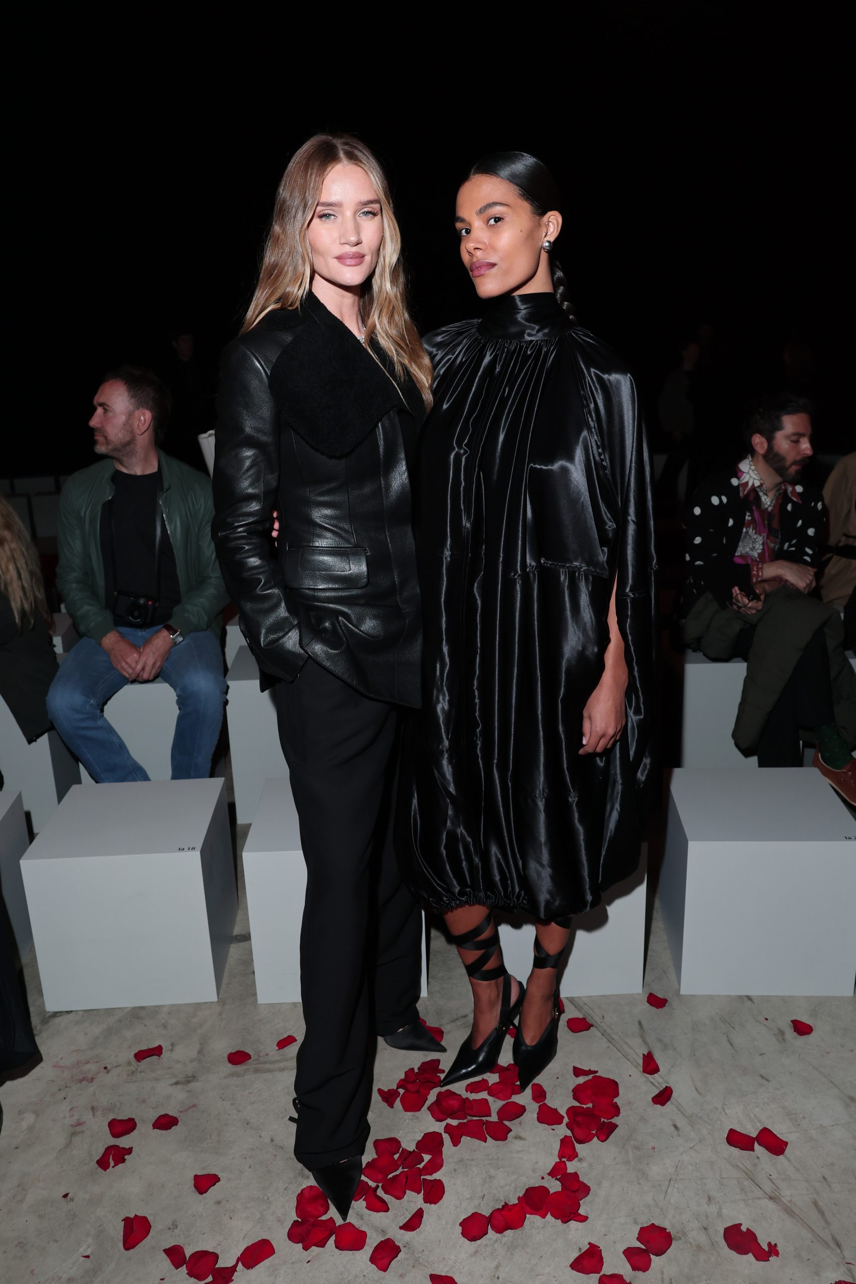 Rosie Huntington-Whiteley and Tina Kunakey are seen front row at the Ferragamo Fall/Winter 2025 Fashion Show during the Milan Fashion Week Fall/Winter 2025/2026 on March 01, 2025 in Milan, Italy. (Photo by Jacopo M. Raule/Getty Images for Ferragamo)
