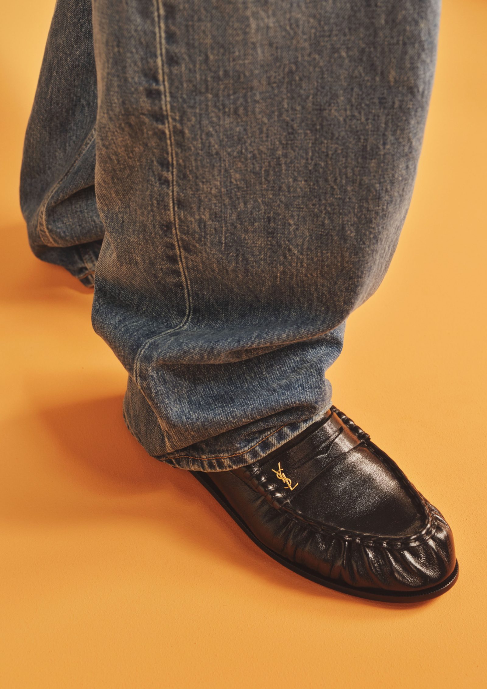 SAINT LAURENT Straight-Leg Jeans; Le Loafer Monogram Logo-Appliqued Leather Penny Loafers
