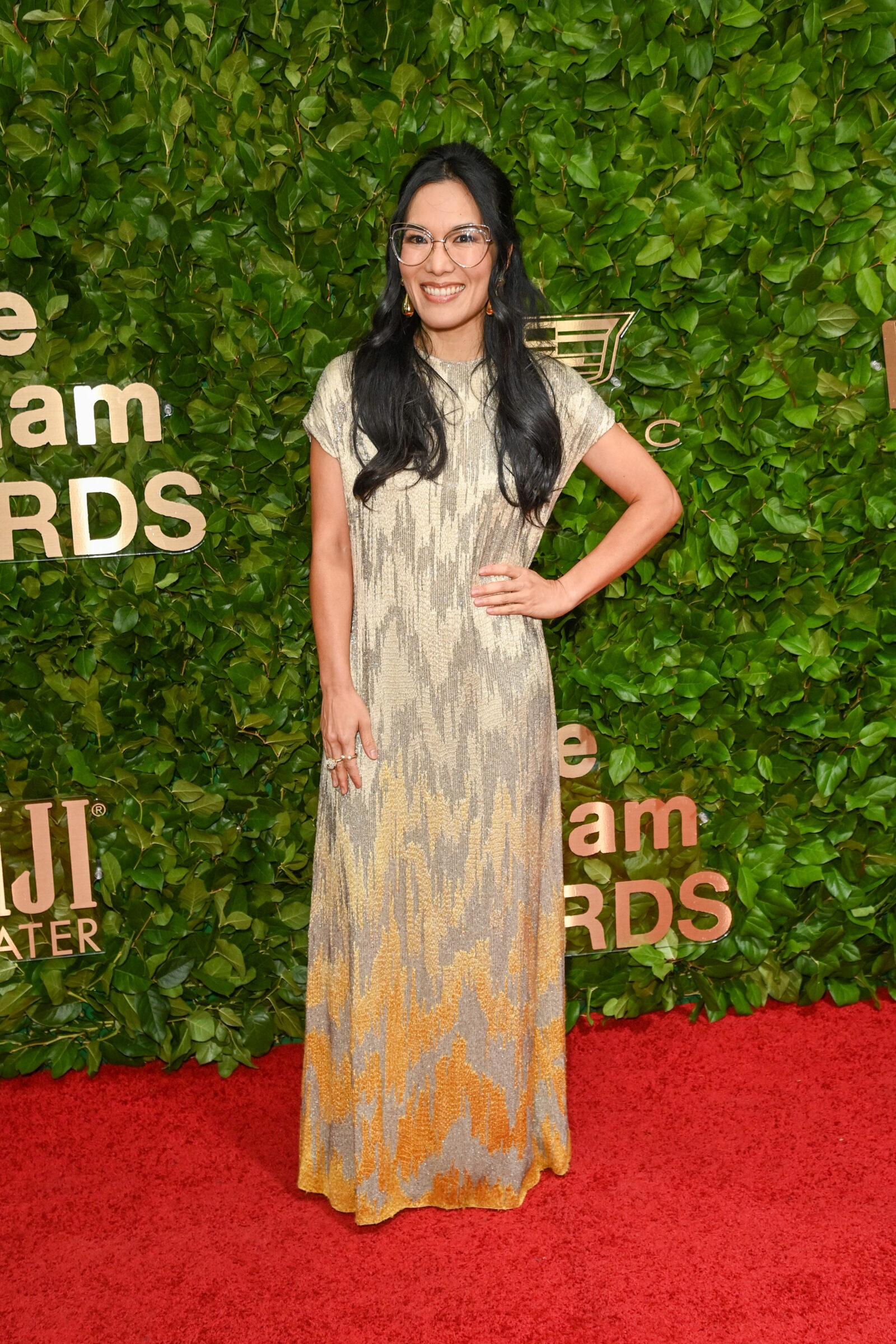 Ali Wong captures attention in a moire-effect embroidered Dior Haute Couture silk dress at the Gotham Awards (Photo by Bryan Bedder/Variety via Getty Images, courtesy of Dior).