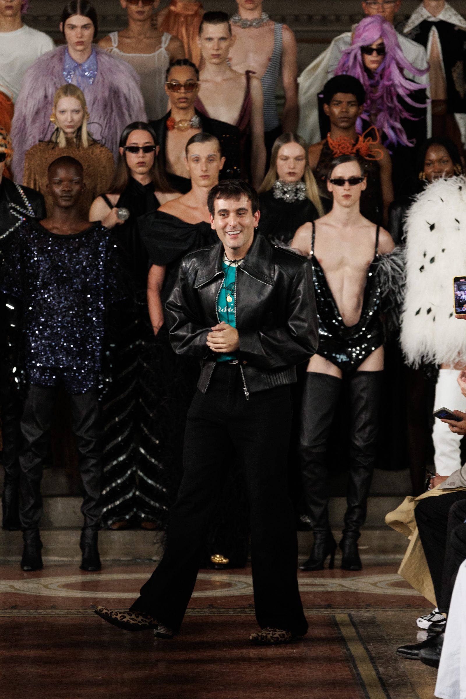 Alejandro Gómez Palomo takes a bow at the close of his Palomo Spain SS25 show in New York.