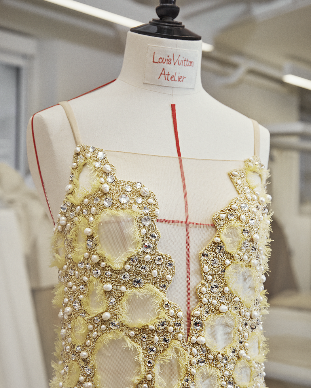 Artisans wove magic into Emma Stone’s Louis Vuitton gown.