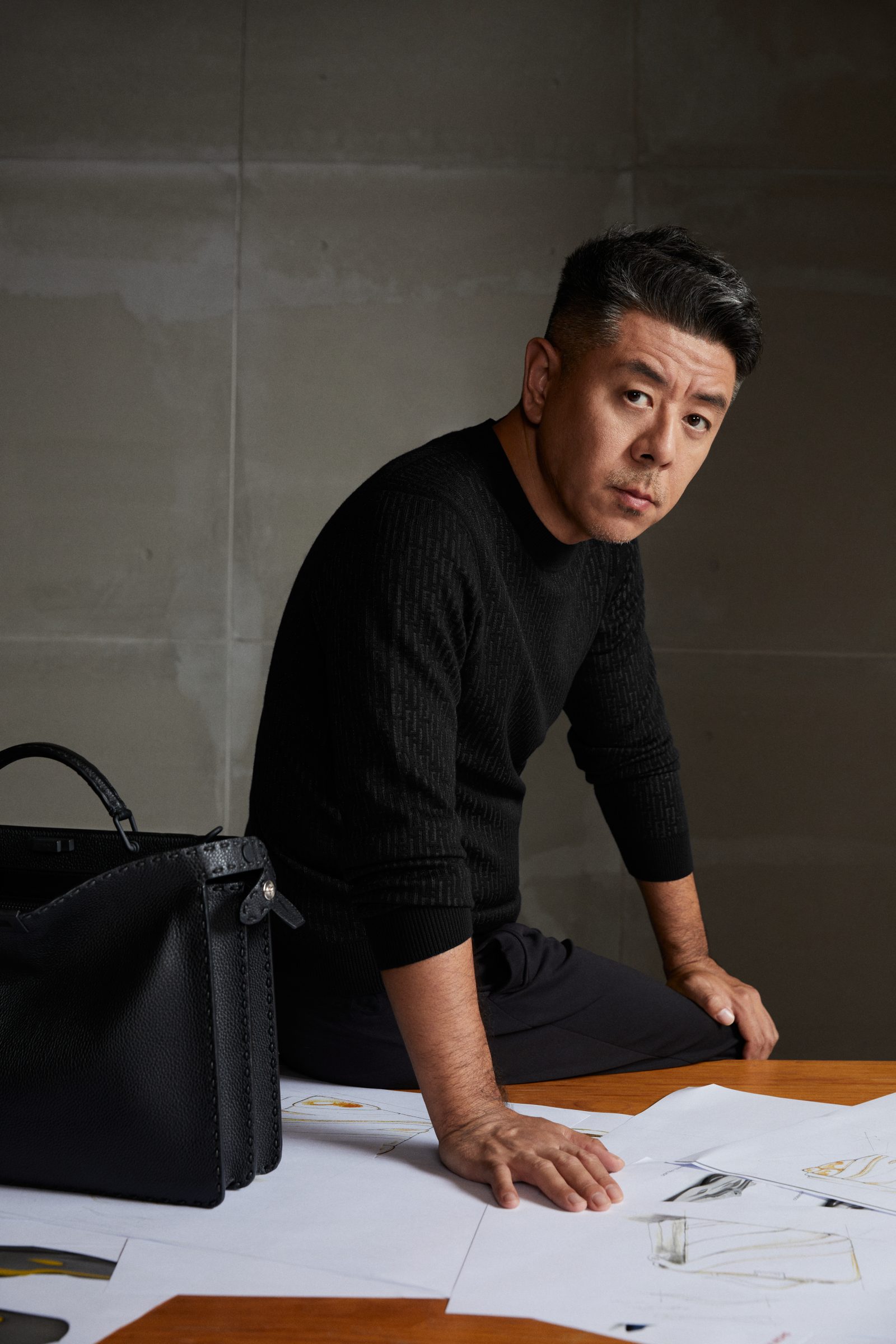 Ma Yansong of MAD Architects seen among the drafts where architecture and fashion design collide.