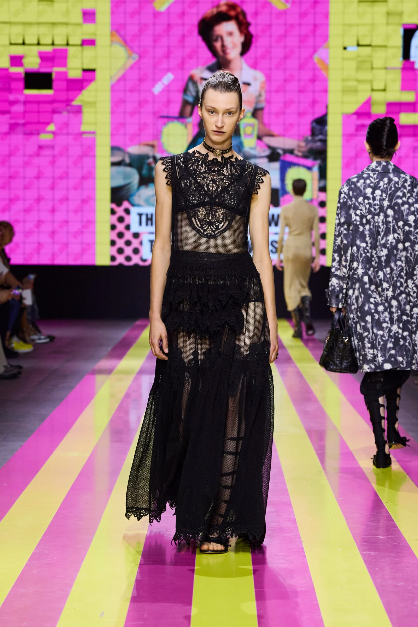Reviving the Romance of Black: Dior’s SS24 collection mesmerizes with intricate lace and bold silhouettes, a modern tribute to timeless elegance.