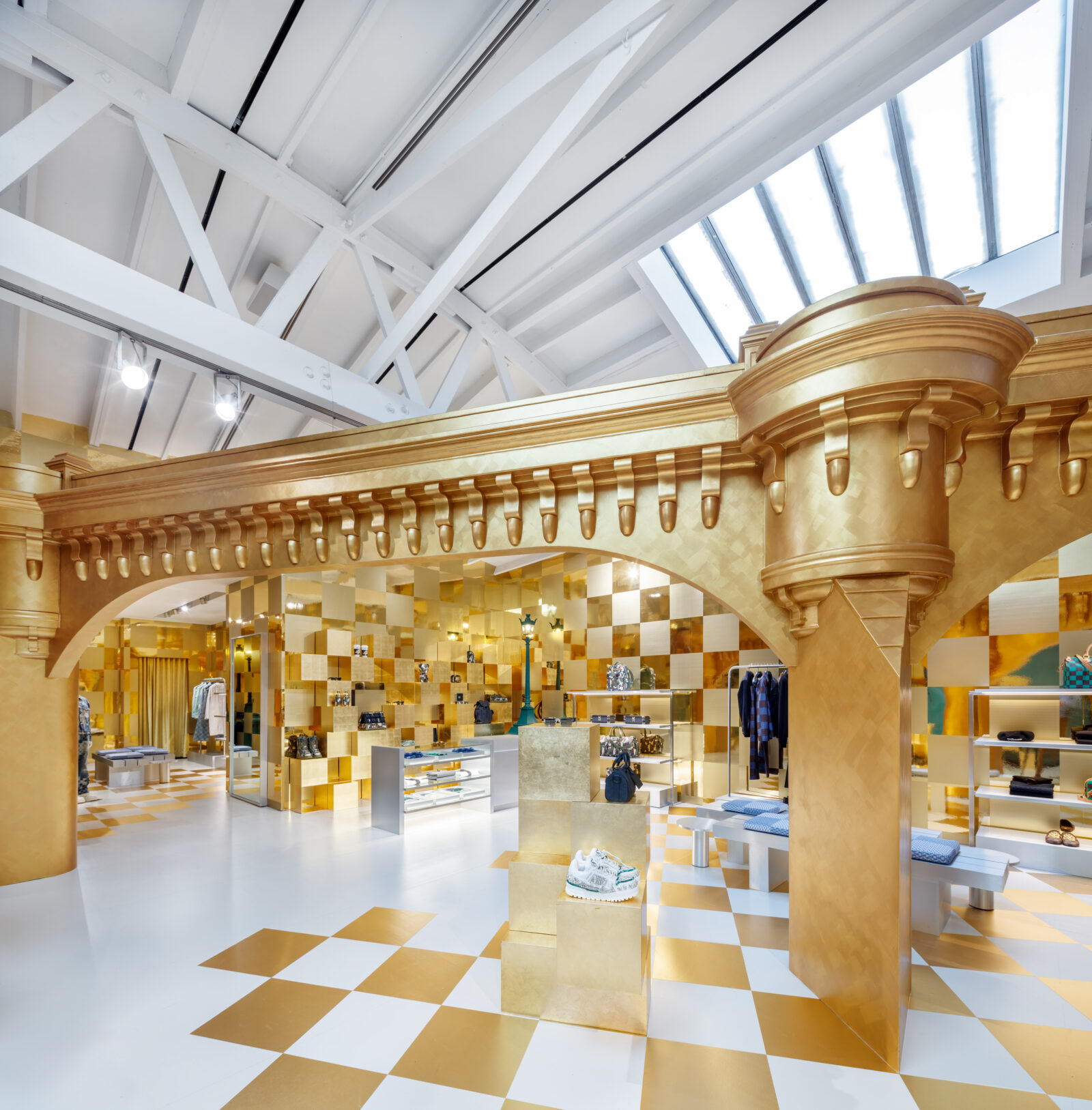 Inside West Hollywood’s Louis Vuitton pop-up, golden hues and Parisian motifs pay tribute to Pharrell Williams’s SS24 collection.