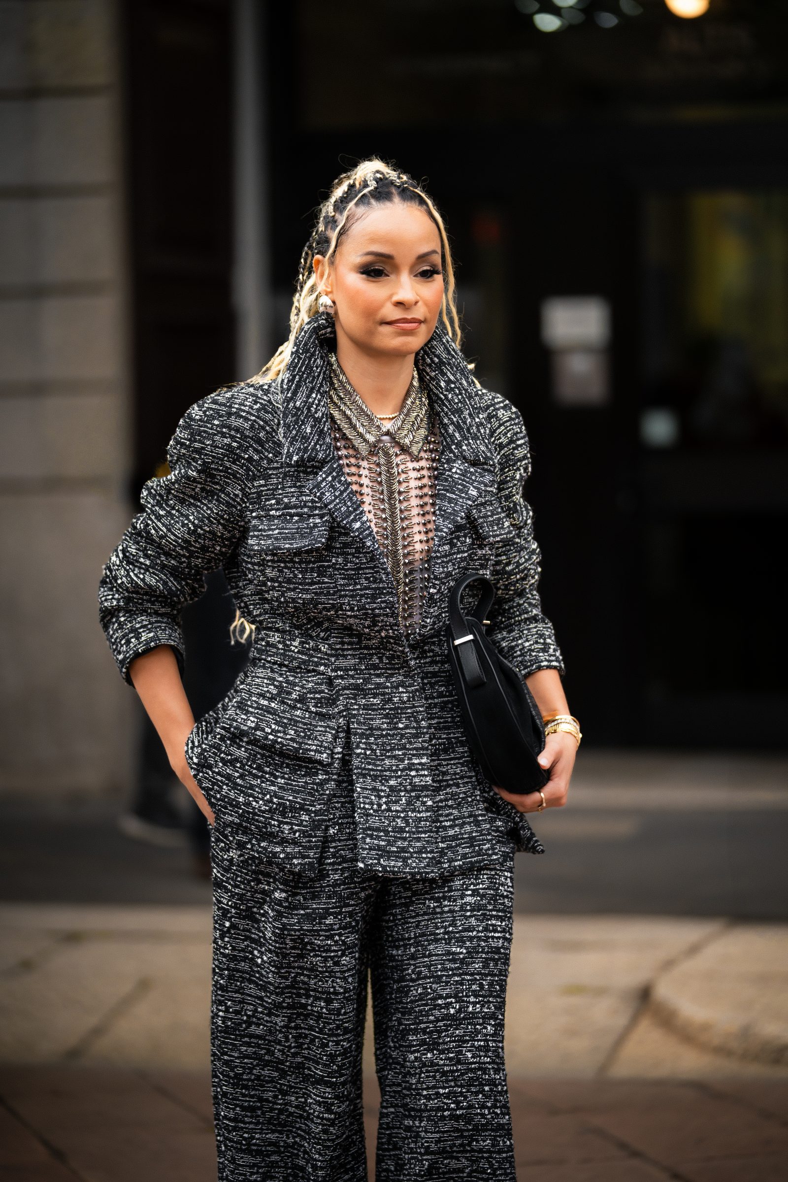 Guest arrives at Alberta Ferretti’s Spring-Summer 2025 runway show in Milan (Image: Riccardo Perdisa for Rain Magazine).
