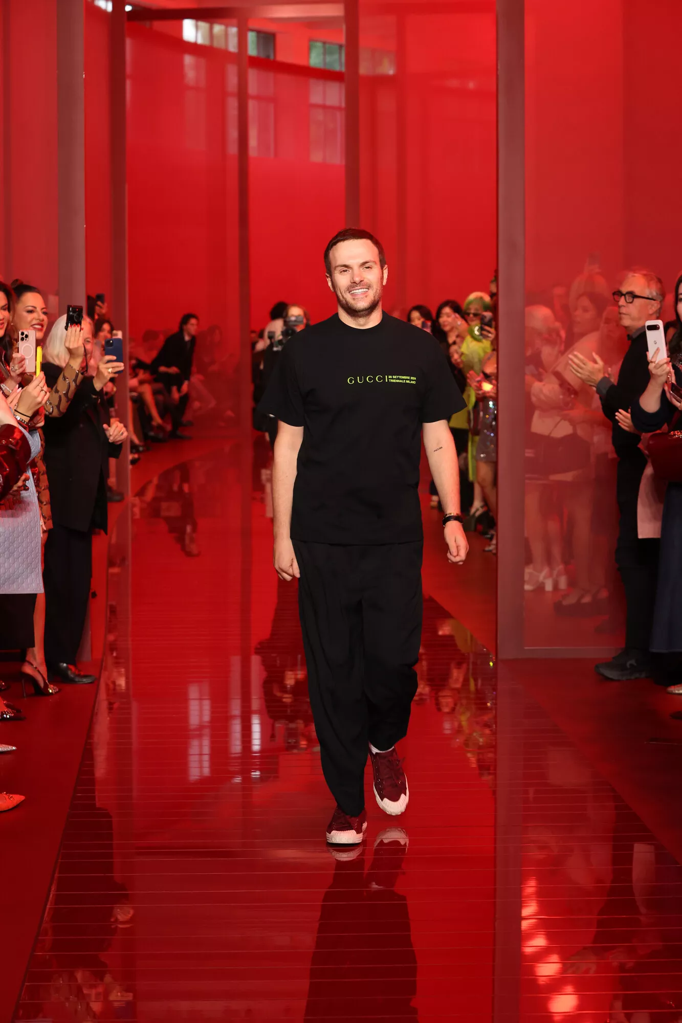 Sebato De Sarno takes a bow at the close of the Gucci Women’s Spring-Summer 2025 Runway Show at Milan Fashion Week.
