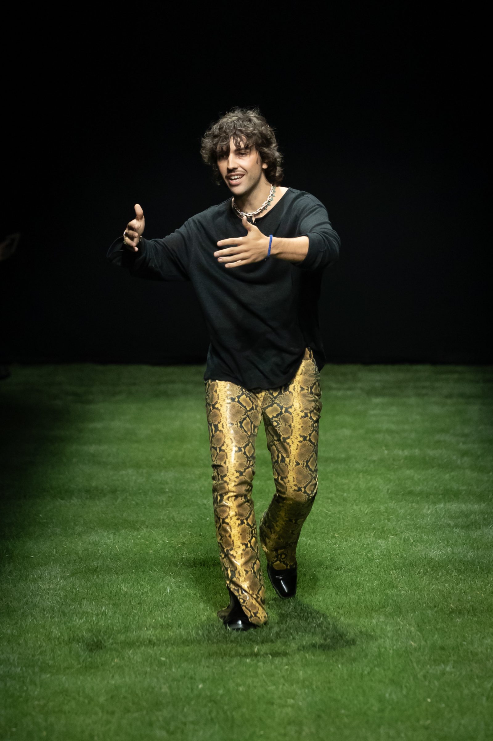 Giuliano Calza takes a bow at the GCDS Spring-Summer 2025 runway show presented at Milan Fashion Week.