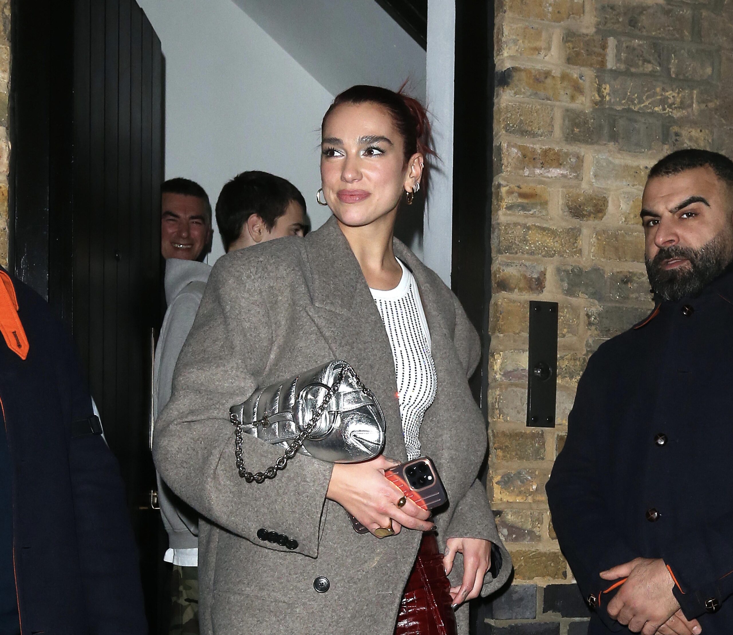 Dua Lipa Captivates London with Signature Style and Gucci Glam