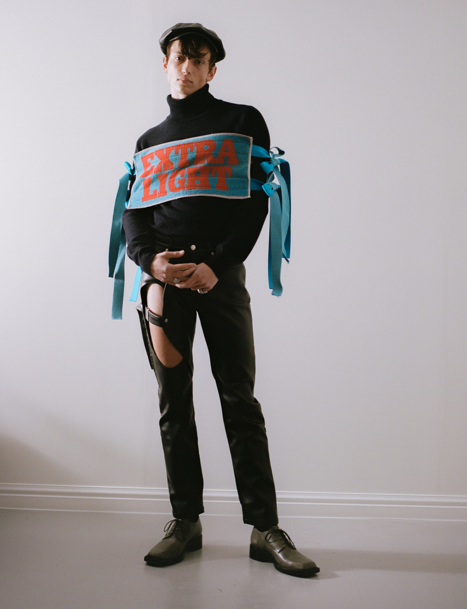 Sweater by JOHN SMEDLEY, top by ADAM JONES, trousers by ZILVER