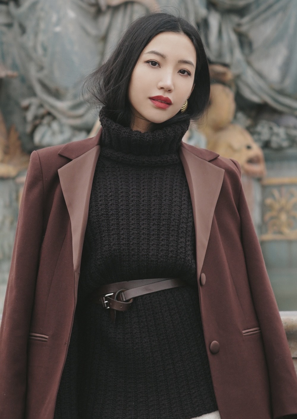 Jessy Chu, founder of Phème Paris, embodies her brand's fusion of Parisian sophistication and Asian elegance in a timeless winter ensemble (Image: Phème Paris)