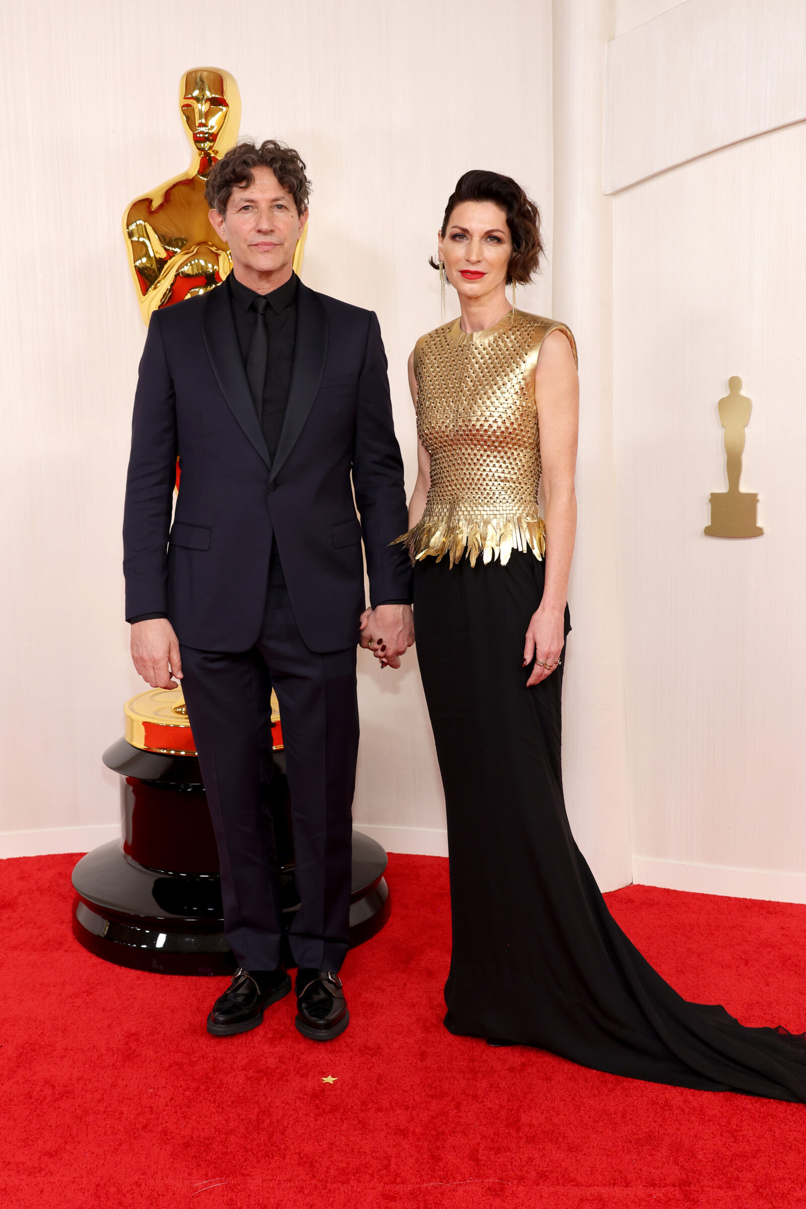 (L-R) Jonathan Glazer and guest attend the 96th Annual Academy Awards on March 10, 2024 in Hollywood, California. (Photo by Mike Coppola/Getty Images)