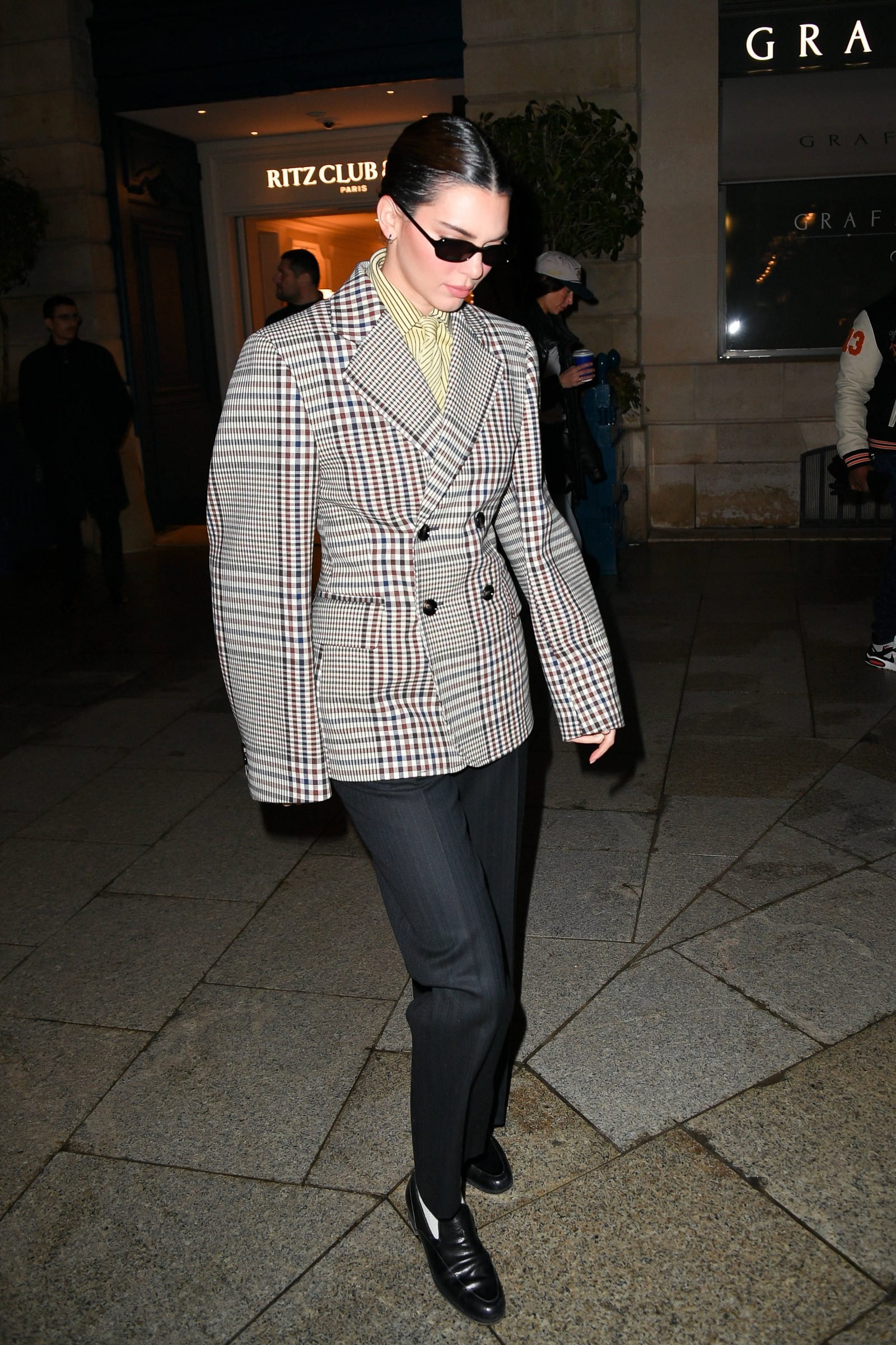 En route to Schiaparelli fittings during Men's Fashion Week, Kendall Jenner elevates menswear in Bottega Veneta (Photo: Courtesy of Bottega Veneta/Cyril Pecquenard)