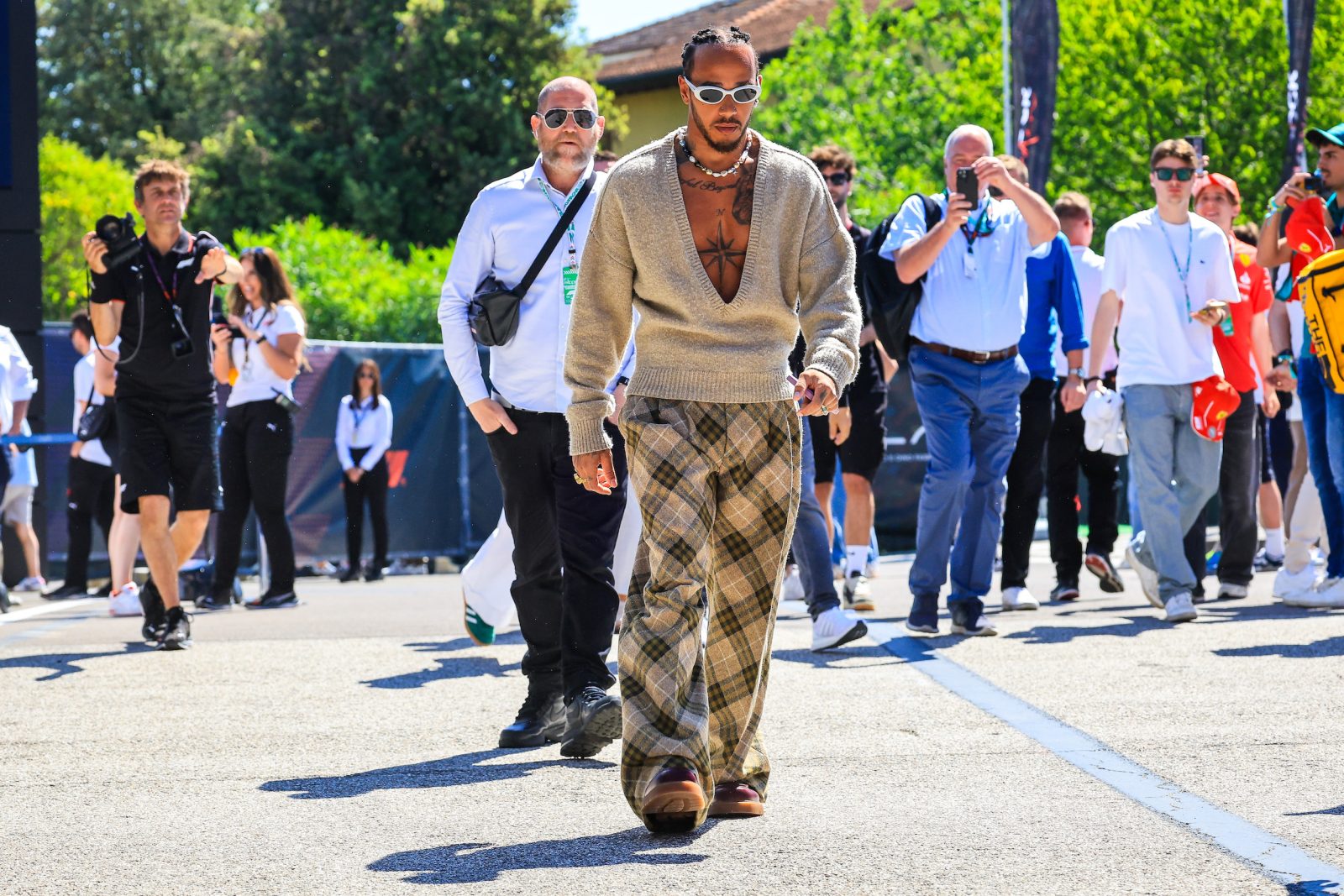 Lewis Hamilton of Great Britain and Mercedes arrives in the paddock during qualifying ahead of the F1 Grand Prix of Emilia-Romagna at Autodromo Enzo e Dino Ferrari Circuit on May 18, 2024 in Imola, Italy. (Photo by Kym Illman/Getty Images)