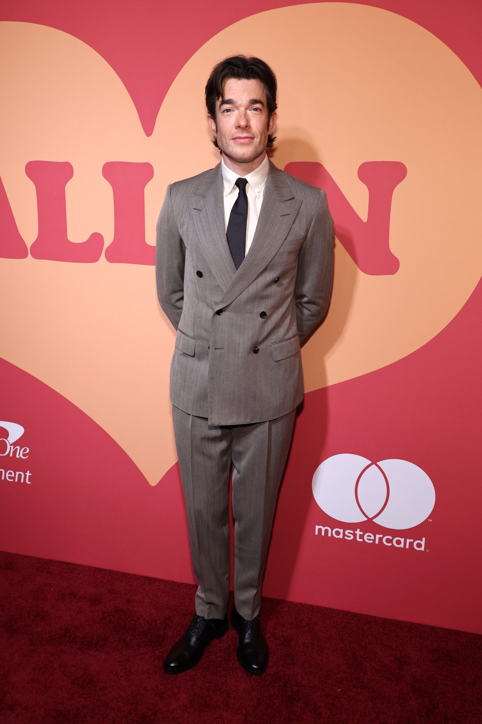John Mulaney wears Loro Piana Milano Double Breasted Jacket to the "All In" premiere at Hudson Theatre in New York City. (Photo by Cindy Ord/Getty Images)