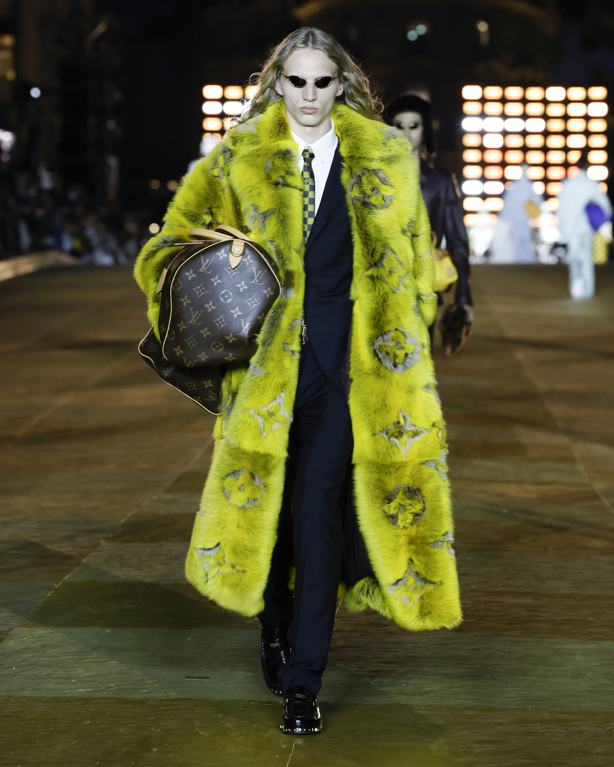 A sleek menswear look from Pharrell Williams' Louis Vuitton Men's Spring-Summer 2025 collection
