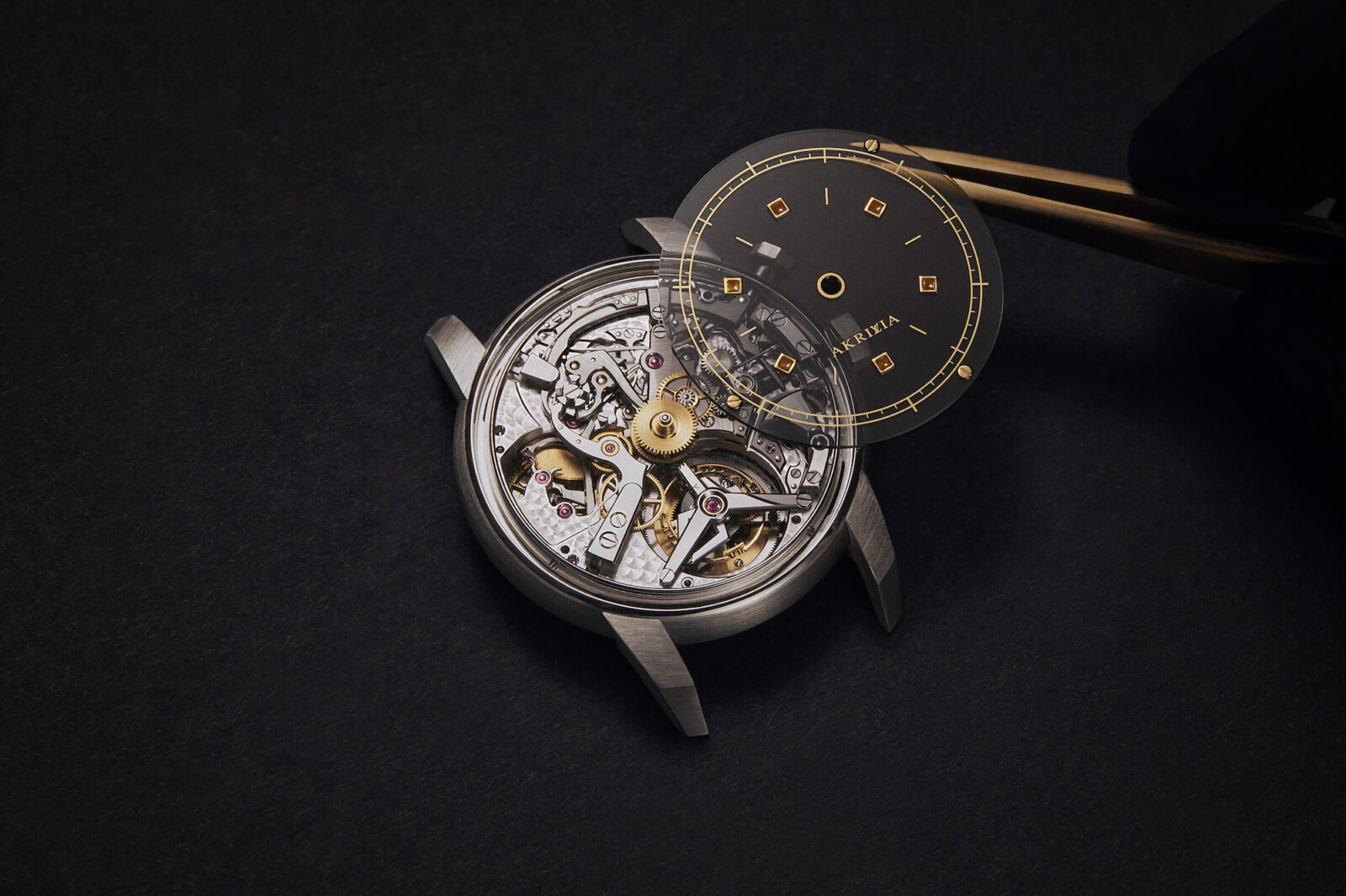 LVRR-01 Assembly: Precisely placing the watch face over its intricate mechanism.