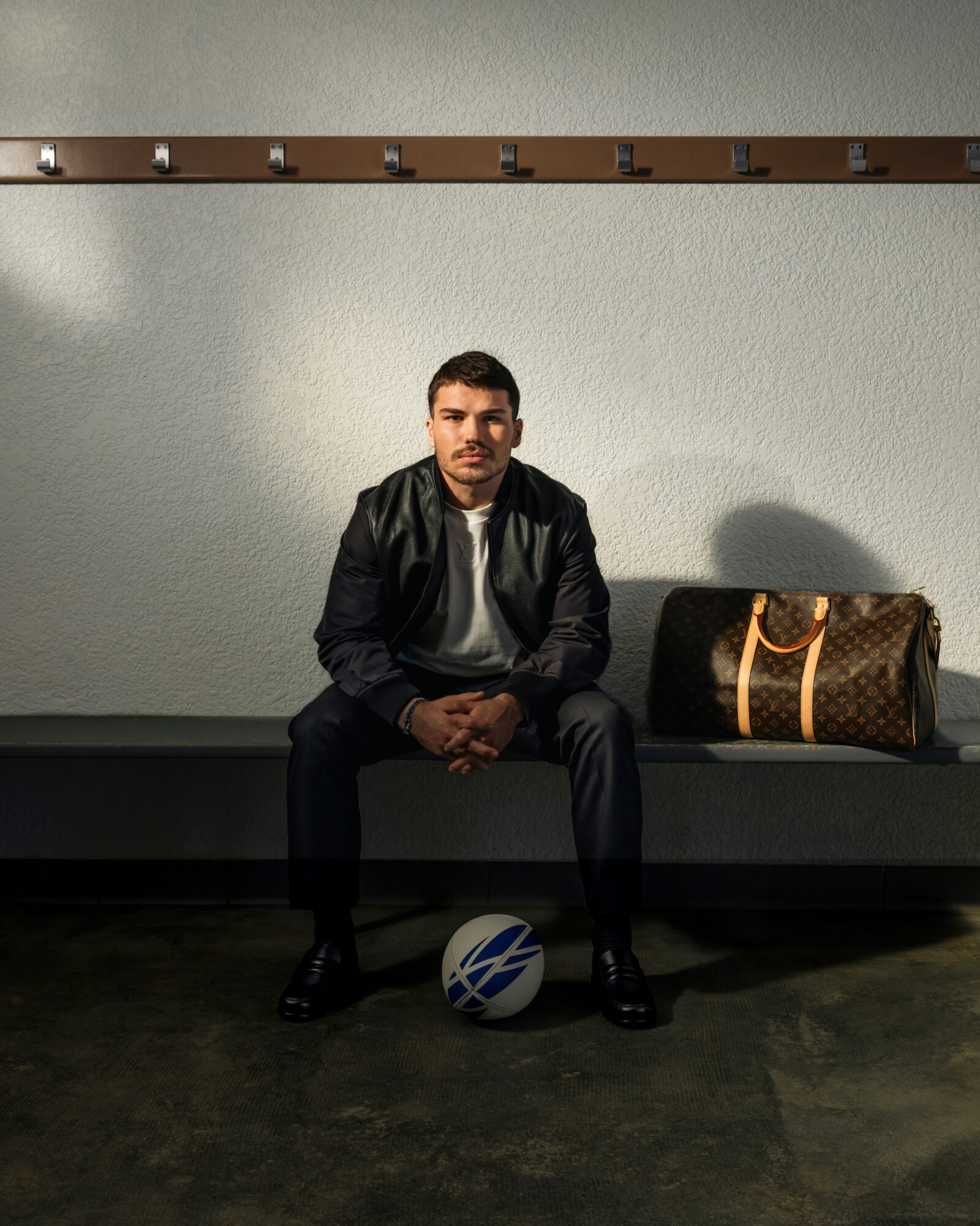 Antoine Dupont exudes timeless elegance as the new face of Louis Vuitton, blending the spirit of championship with the artistry of luxury fashion. (Photo Credit: Nelson Rosier)