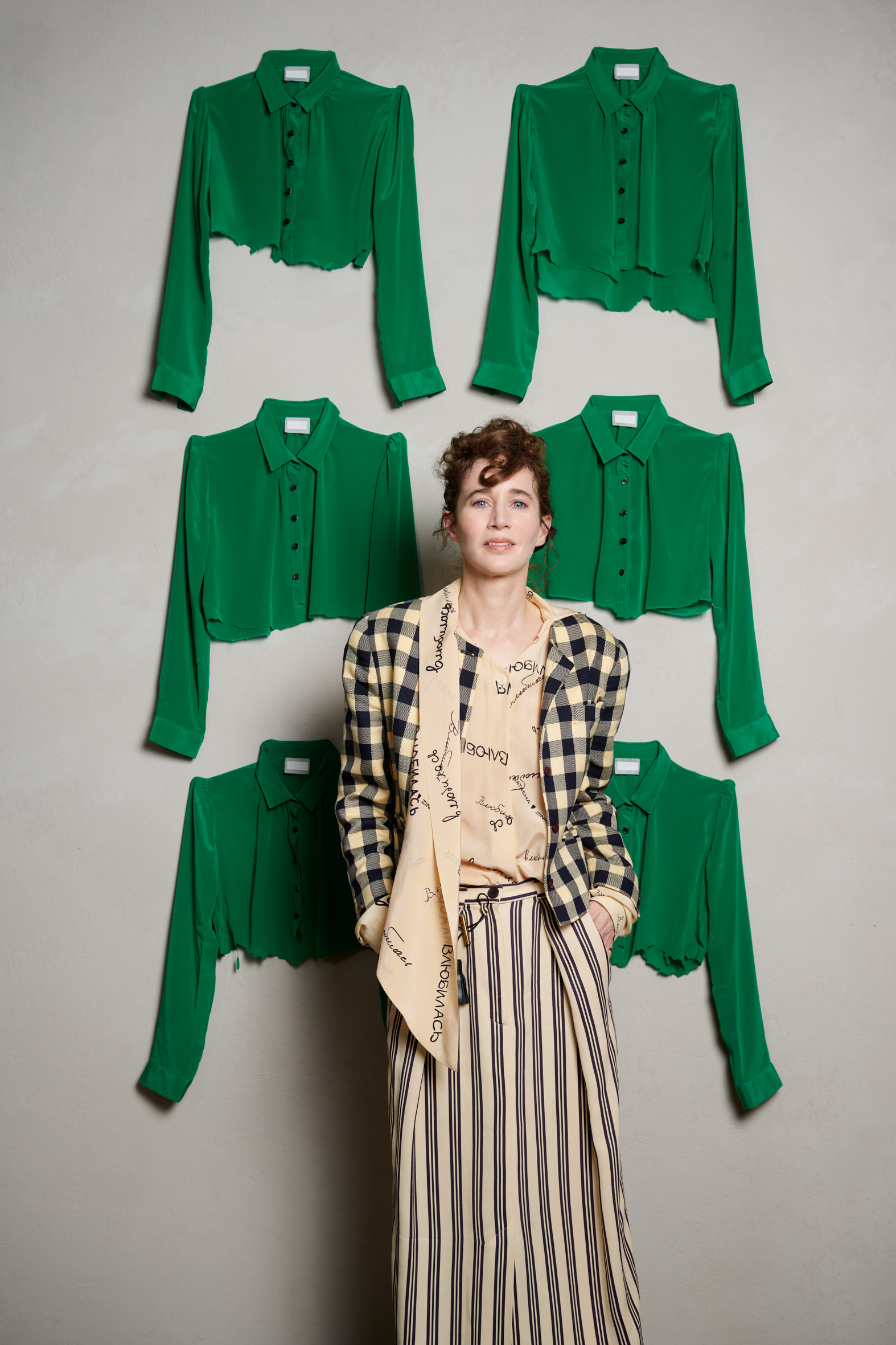 Miranda July photographed by Valentina Sommariva against the backdrop of her installation.
