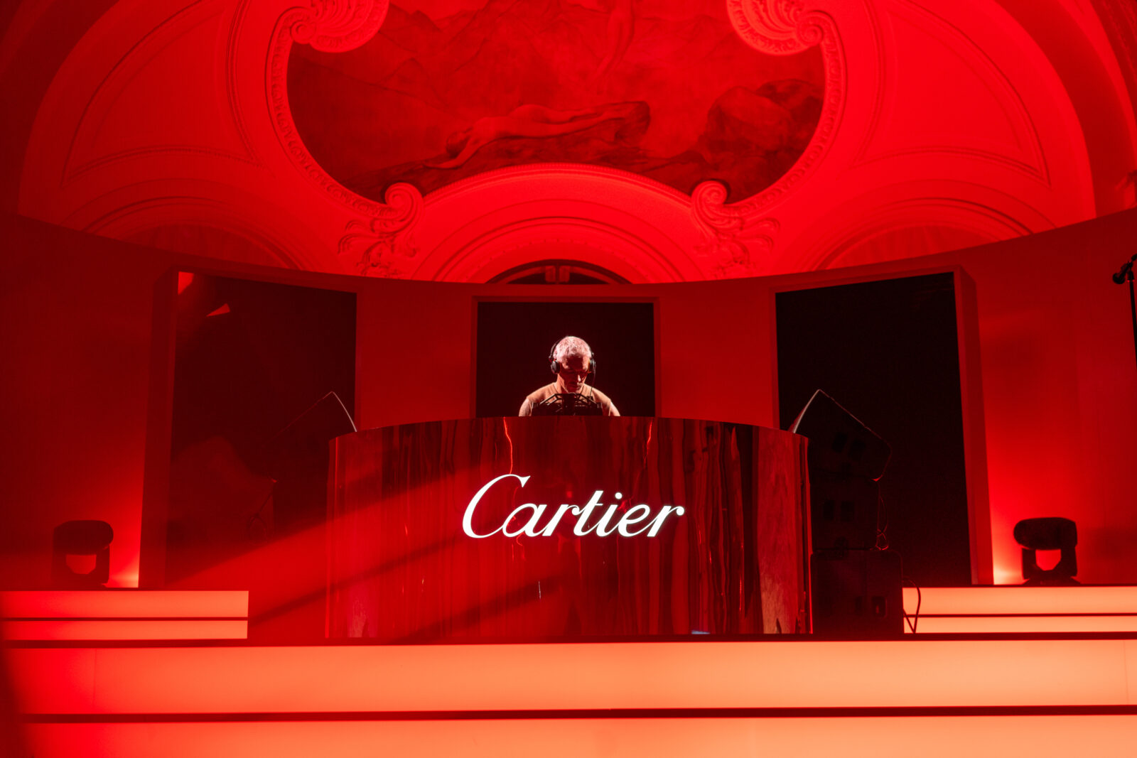 A DJ performs at Cartier's Centennial Trinity Celebration at the Petit Palais in Paris. (Image courtesy of Astrid Staes)