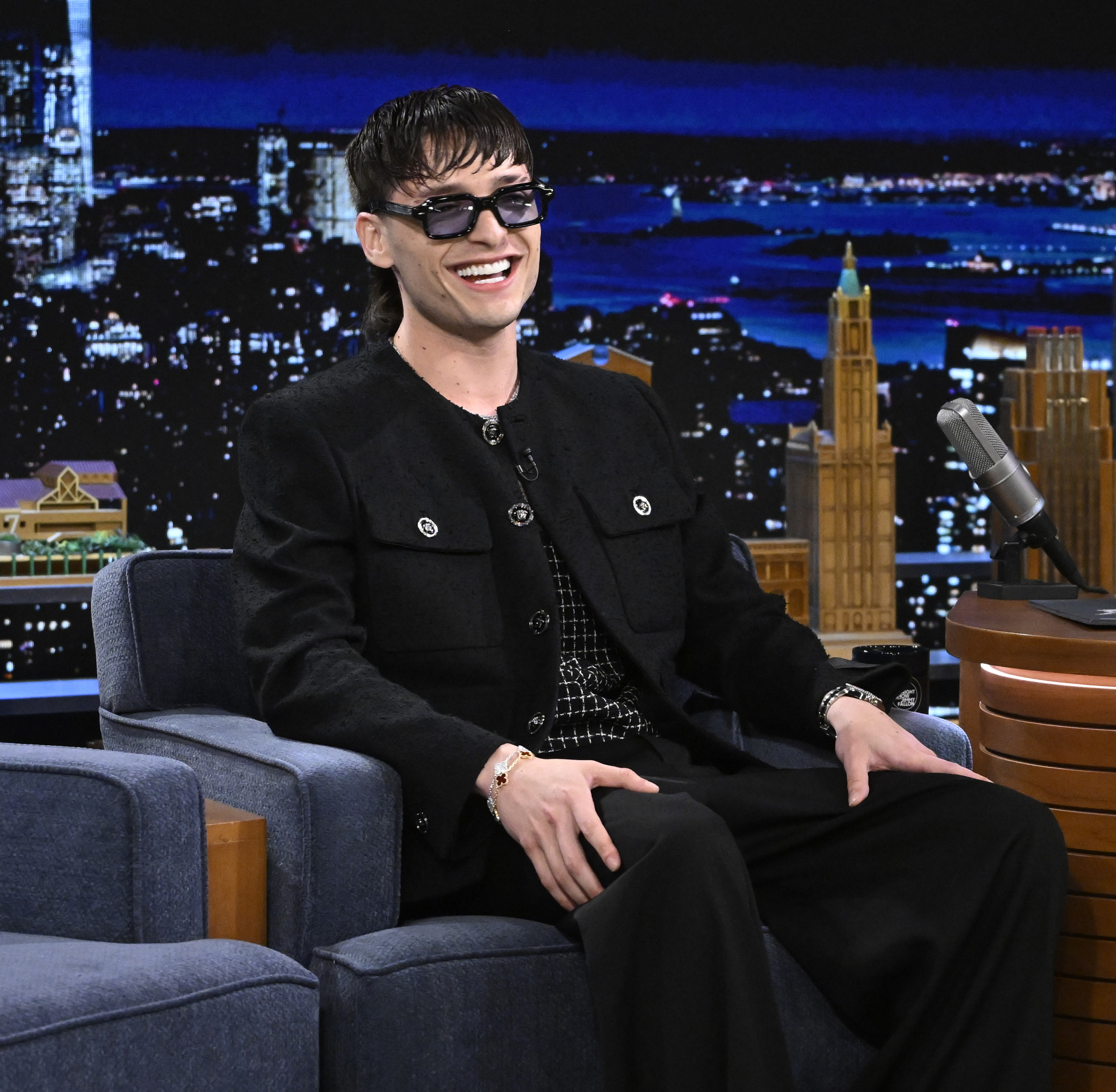 Peso Pluma Stuns in Versace on The Tonight Show with Jimmy Fallon: The Captivating Fusion of Corridos Tumbados and High Fashion