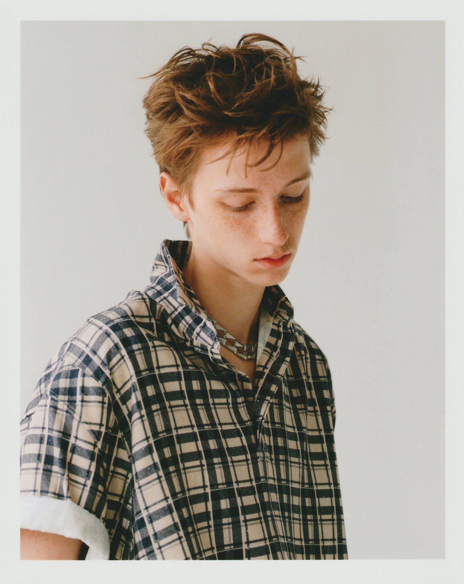 Oscar wears shirt by DIOR, necklace, stylist's own Oscar wears shirt by DIOR, necklace, stylist