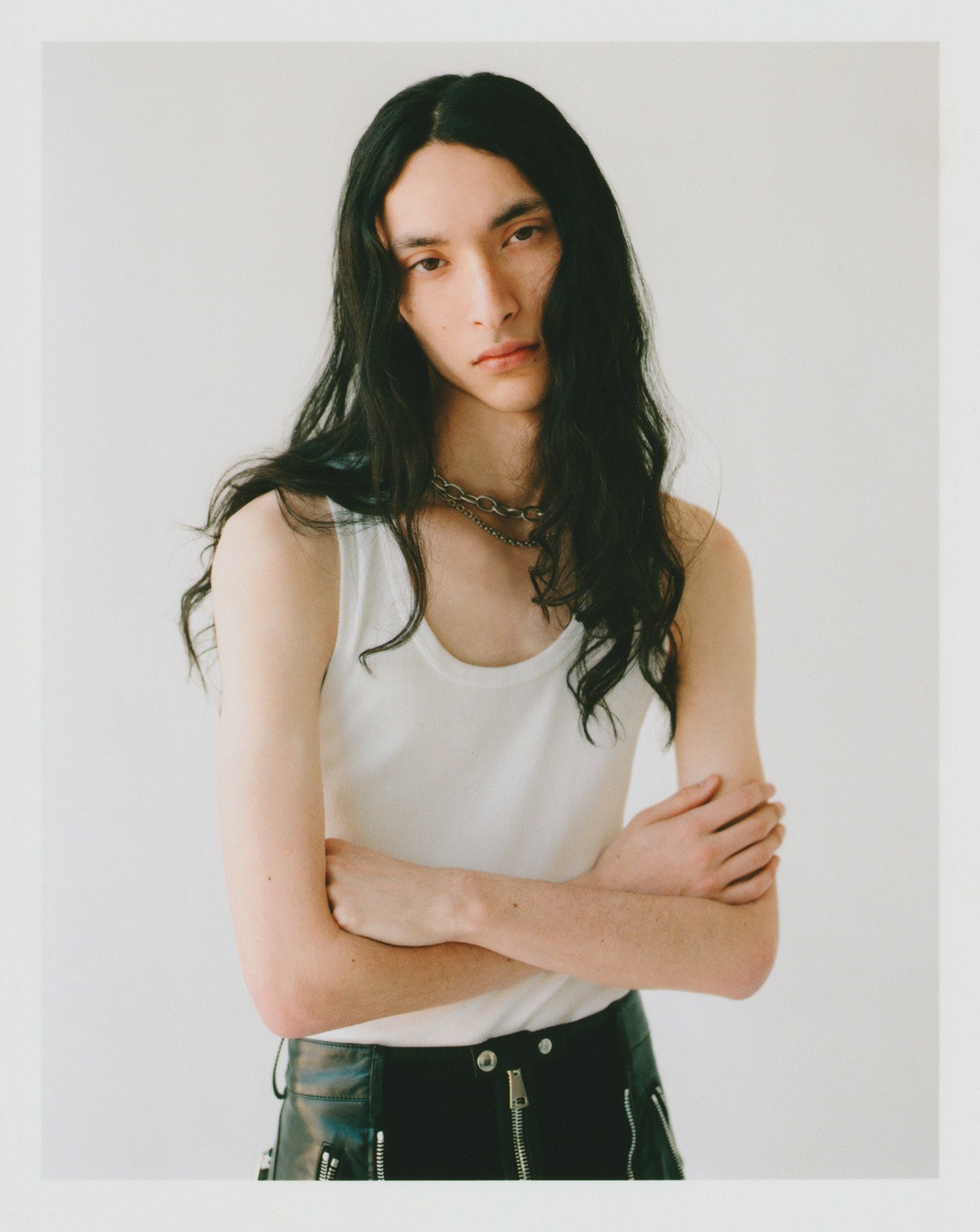 Aiden wears top and necklace, stylist's own, leather pants by ALEXANDER MCQUEEN Aiden wears top and necklace, stylist