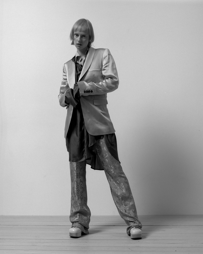 jacket, shirts, and pants by ANN DEMEULEMEESTER, boots by JIL SANDER