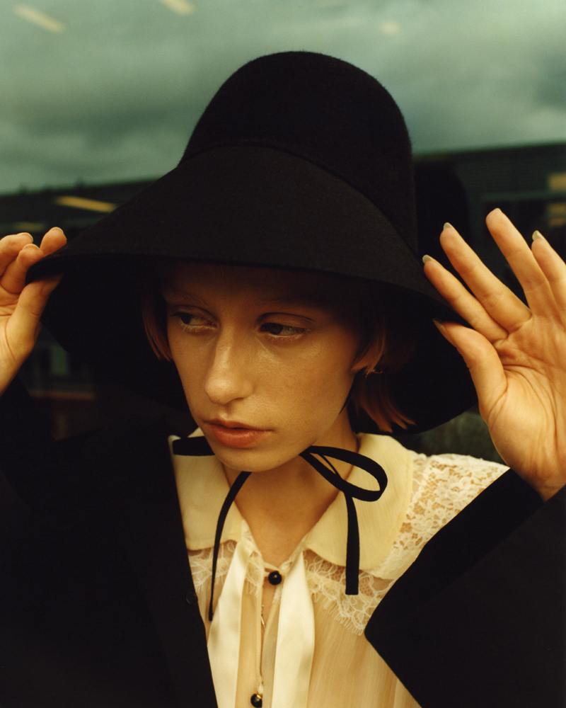 Coat by ROBERTS WOOD, shirt by GUCCI, hat by VALENTINO