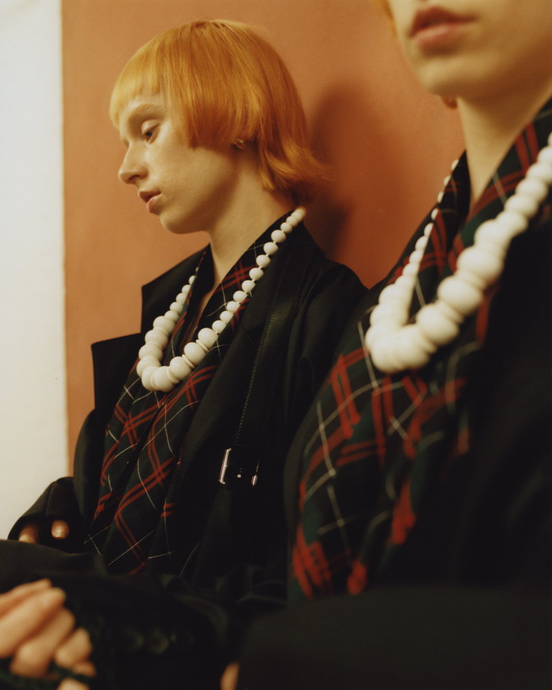coat and belt by CHRISTOPHER KANE, dress by A.W.A.K.E. MODE, vintage necklace