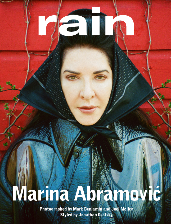 Coat by WALTER VAN BEIRENDONCK, scarf, stylist's own marina abramovic rain magazine cover