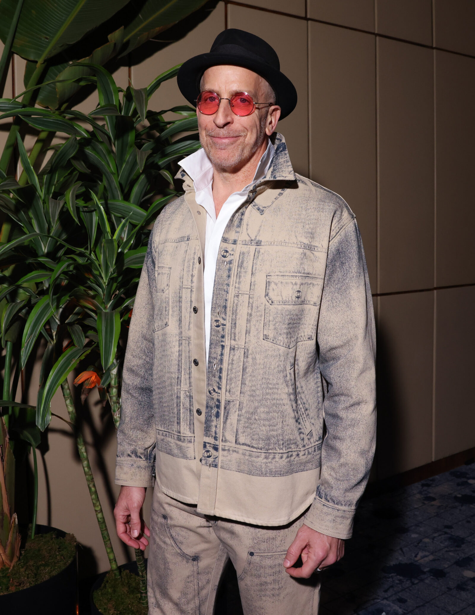 Todd A. Kessler, the creative force behind "The New Look", steps out at the series' premiere, exuding a casual yet distinctive flair, perfectly complementing the artistic spirit of the occasion.