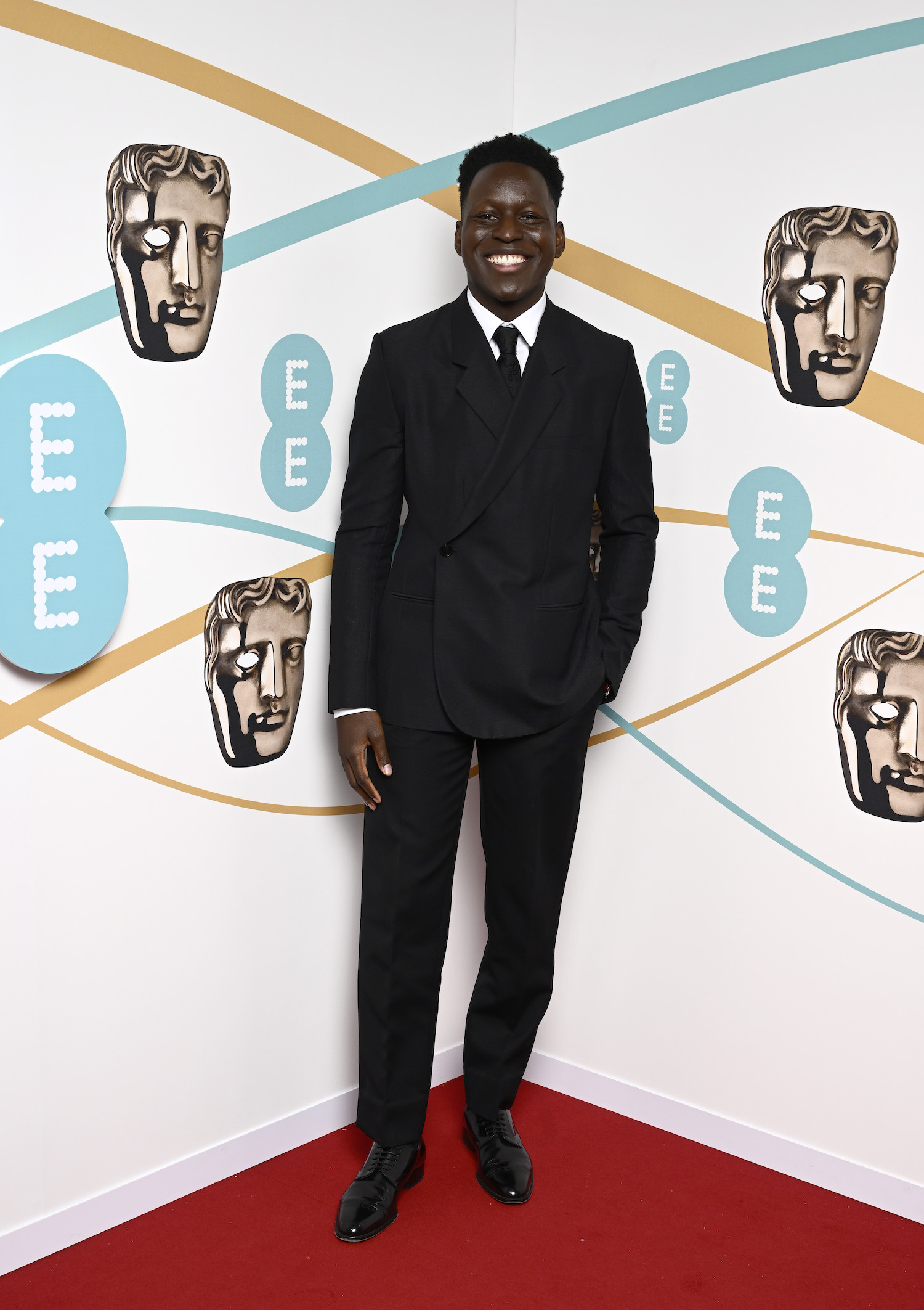 Toheeb Jimoh attends the EE BAFTA Film Awards 2023 at The Royal Festival Hall on February 19, 2023 in London, England. (Photo by Gareth Cattermole/BAFTA/Getty Images for BAFTA; image courtesy of Dior)