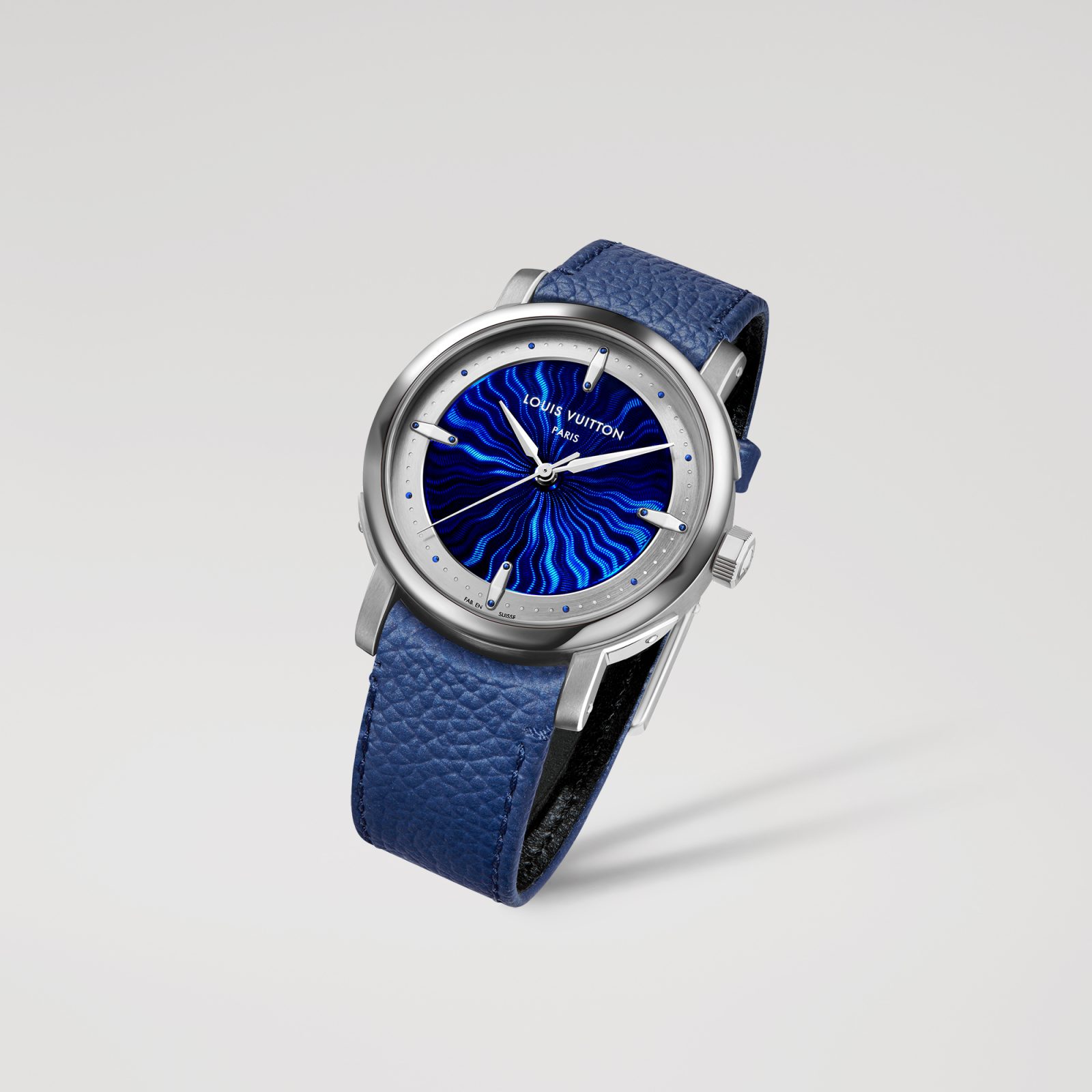 Detail of the platinum case with signature trunk-inspired rivet lugs and blue calfskin strap. (Image: Courtesy of Louis Vuitton)