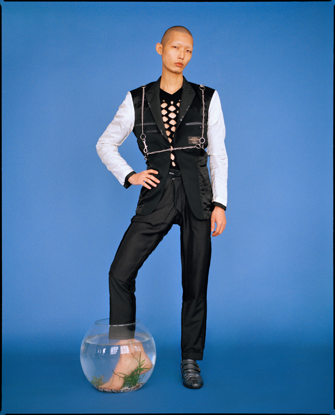 suit by TIGER OF SWEDEN top by JEAN PAUL GAULTIER chain by MARTINE ALI shoes by DUMITRASCU Xu Meen editorial